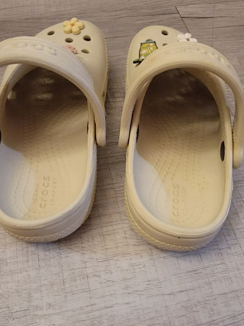 CROCS Kids Cream Slip-On Clogs with Fun Charms